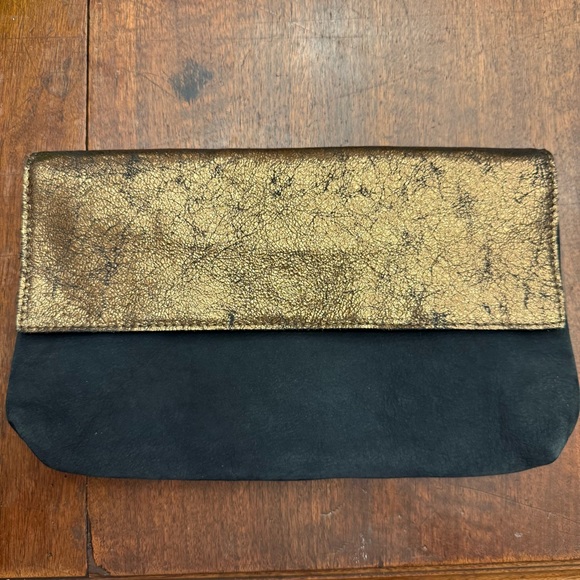 Anthropologie Handbags - Anthropologie Black/Gold(bronze) metallic leather clutch NWOT